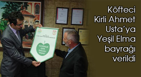 Köfteci Kirli Ahmet Usta’ya Yeşil Elma bayrağı verildi